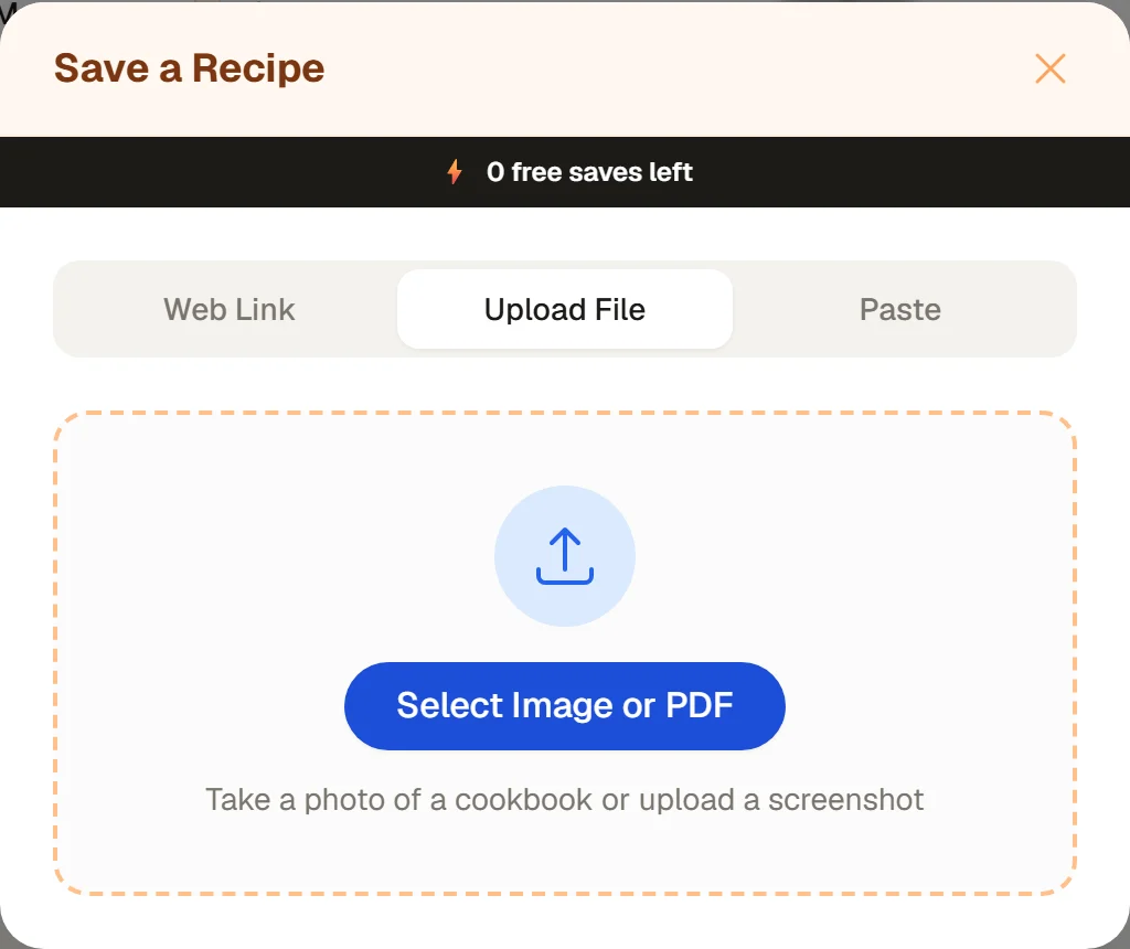The Upload File tab of the Save a Recipe window: an upload icon, a Select Image or PDF button and the line Take a photo of a cookbook or upload a screenshot