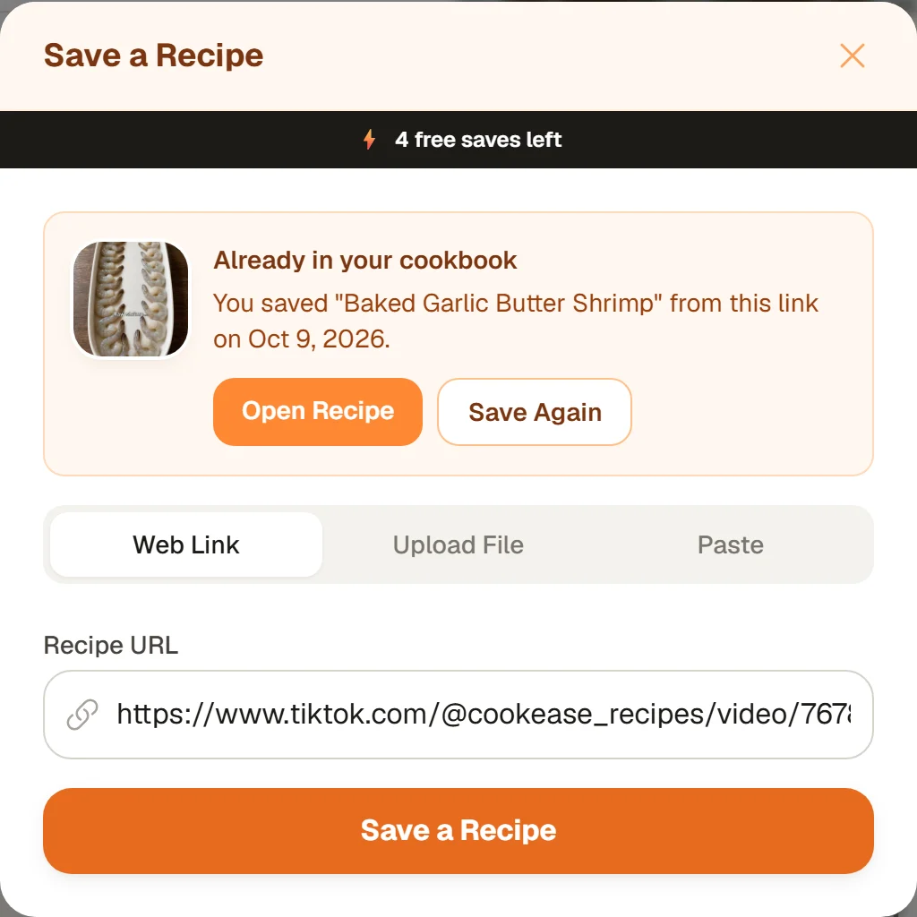 The Save a Recipe window on the website showing Already in your cookbook: You saved Baked Garlic Butter Shrimp from this link on Oct 9, 2026, with Open Recipe and Save Again buttons