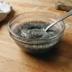 A chia egg: chia seeds swollen into a clear jelly in a small bowl